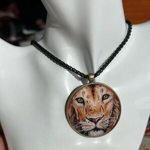 Handpainted fierce male lion king 2” lg pendant on brass bezel w 16” blk chain